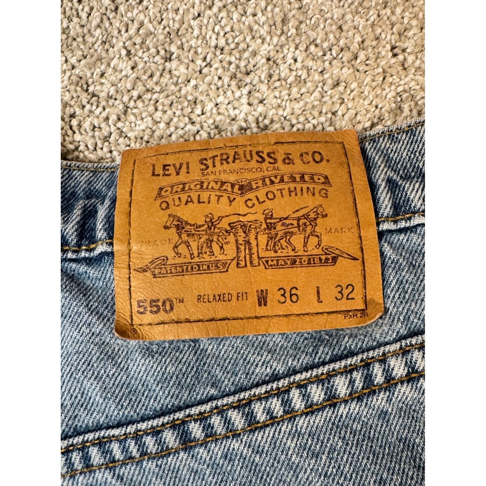 Vintage Levis 550 Orange Tab Relaxed Light Wash Denim Jeans Mens 36x32 Grungy